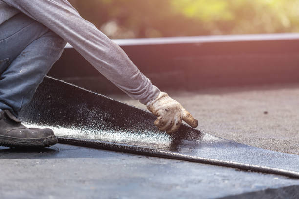 Professional Basement Waterproofing technician working in Freeport, IL